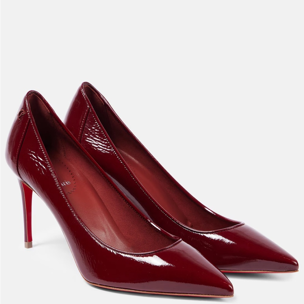 CHRISTIAN LOUBOUTIN
Sporty Kate 85 patent leather pumps